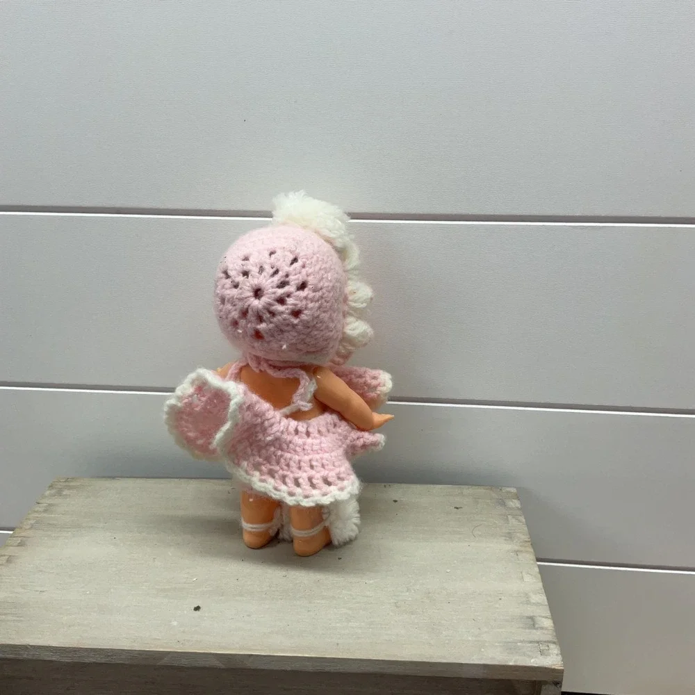 Vintage Irwin USA 6 Inch Hard Plastic Baby Doll Pink Crochet Outfit Side Glance